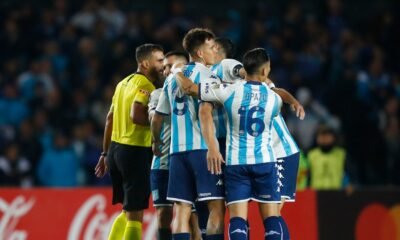 manotazo y reproches airados el tenso cruce entre fernando gago y cesar farias en el duelo entre racing y aucas por la copa libertadores